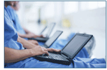 photo of doctors sitting with laptops